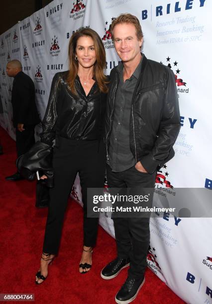 Cindy Crawford and Rande Gerber attend the B. Riley & Co. 8th Annual "Big Fighters, Big Cause" Charity Boxing Night benefiting the Sugar Ray Leonard...