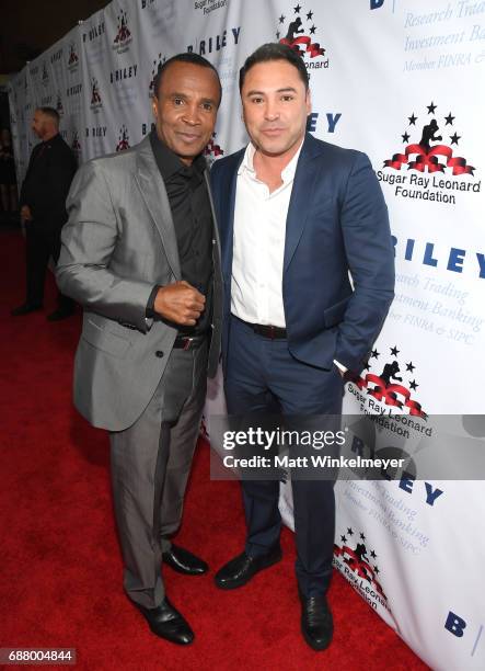 Sugar Ray Leonard and Oscar De La Hoya attend the B. Riley & Co. 8th Annual "Big Fighters, Big Cause" Charity Boxing Night benefiting the Sugar Ray...