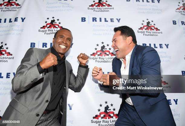 Sugar Ray Leonard and Oscar De La Hoya attend the B. Riley & Co. 8th Annual "Big Fighters, Big Cause" Charity Boxing Night benefiting the Sugar Ray...