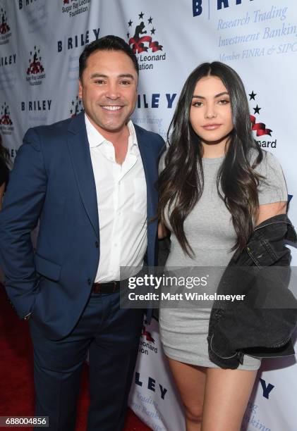 Oscar De La Hoya and Atiana de la Hoya attend the B. Riley & Co. 8th Annual "Big Fighters, Big Cause" Charity Boxing Night benefiting the Sugar Ray...