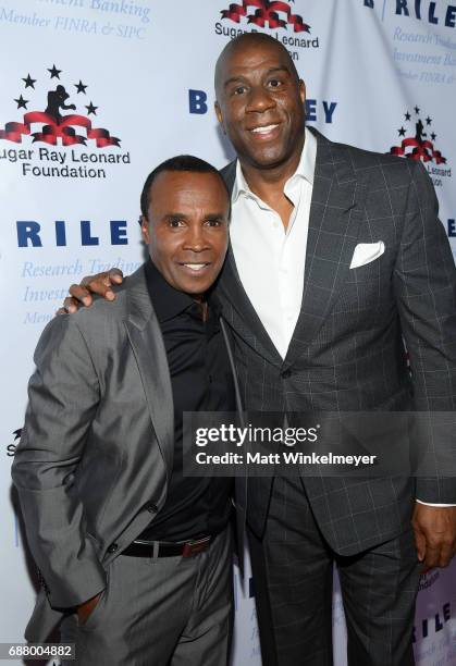 Sugar Ray Leonard and Magic Johnson attend the B. Riley & Co. 8th Annual "Big Fighters, Big Cause" Charity Boxing Night benefiting the Sugar Ray...