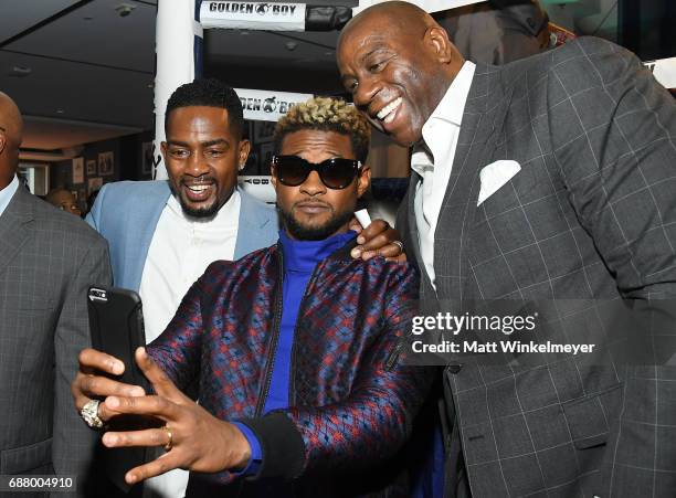 Bill Bellamy, Usher, and Magic Johnson attend the B. Riley & Co. 8th Annual "Big Fighters, Big Cause" Charity Boxing Night benefiting the Sugar Ray...