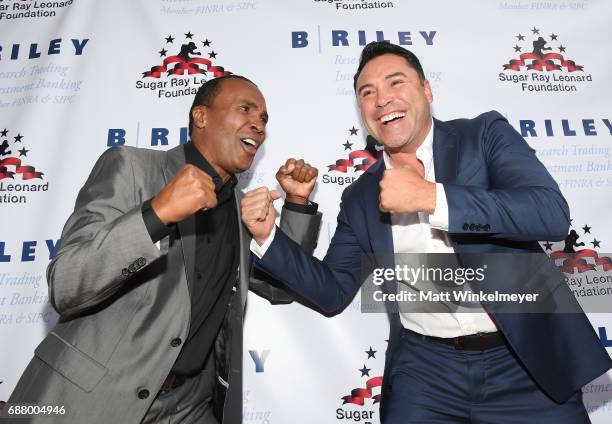 Sugar Ray Leonard and Oscar De La Hoya attend the B. Riley & Co. 8th Annual "Big Fighters, Big Cause" Charity Boxing Night benefiting the Sugar Ray...