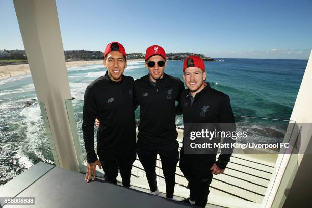 Roberto Firmino, Lucas Levia and Alberto Moreno of Liverpool pose during a Liverpool FC Fan Day at Bondi Beach on May 25, 2017 in Sydney, Australia.