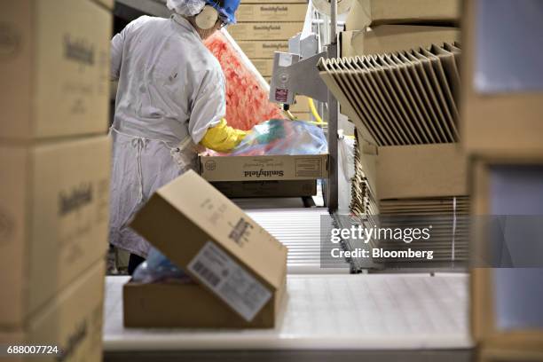 The Smithfield Foods Inc. Logo is displayed on a box at the company's pork processing facility in Milan, Missouri, U.S., on Wednesday, April 12,...