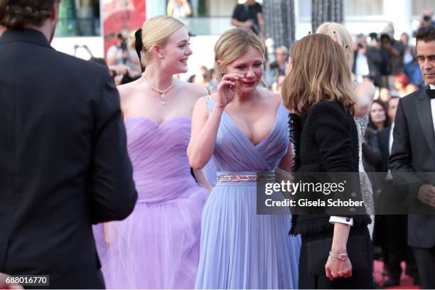 Elle Fanning, Kirsten Dunst cries, Sofia Coppola and Colin Farrell attend the 'The Beguiled' screening during the 70th annual Cannes Film Festival at...