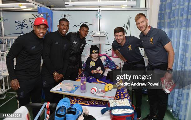 Steven Gerrard ex player for Liverpool with Rhian Brewster, Ragnar Klavan, Nathaniel Clyne and Georginio Wijnaldum of Liverpool during a visit to...