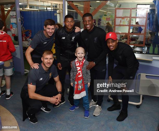 Steven Gerrard ex player for Liverpool with Rhian Brewster, Ragnar Klavan, Nathaniel Clyne and Georginio Wijnaldum of Liverpool during a visit to...