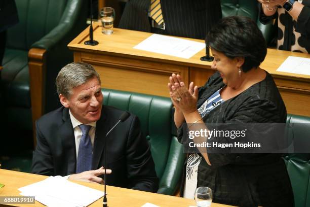 Prime Minister Bill English is applauded by deputy leader Paula Bennett at the conclusion of his speech during the 2017 budget presentation at...