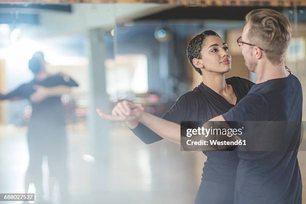 dance couple in studio - baile de salón fotografías e imágenes de stock