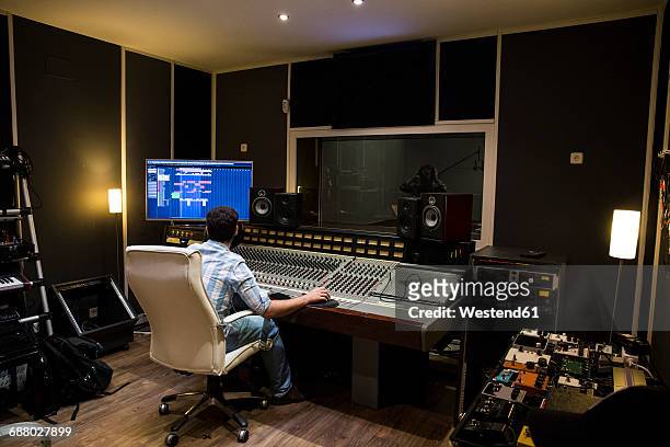 musical recording in a recording studio - music producer stock pictures, royalty-free photos & images