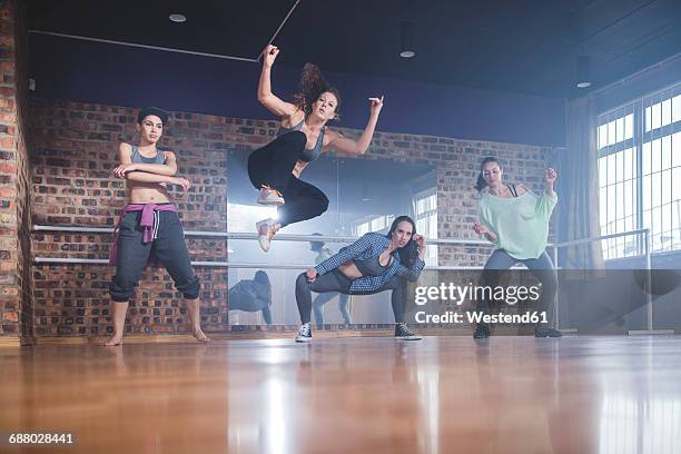 female hip hop dancers performing in studio - hip hopper stock pictures, royalty-free photos & images