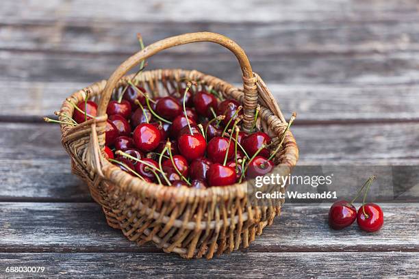 wickerbasket of sweet cherries - cherry foto e immagini stock