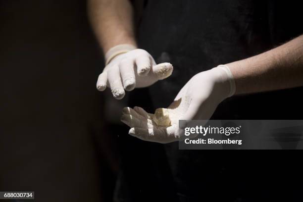 Chef prepares 'Idly sambar' in the kitchen of Gaggan restaurant in Bangkok, Thailand, on Thursday, May 4, 2017. After his restaurant's third straight...