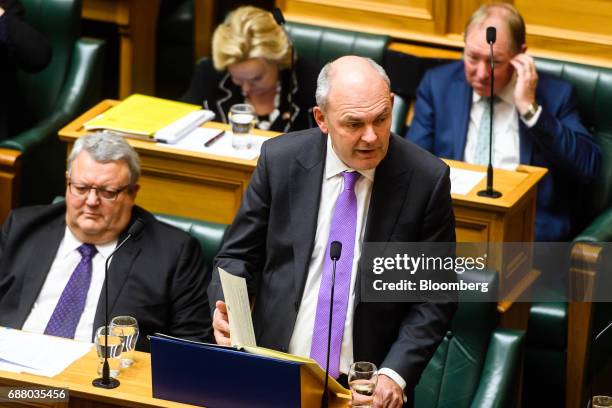 Steven Joyce, New Zealand's finance minister, bottom right, delivers the budget at the parliament in Wellington, New Zealand, on Thursday, May 25,...