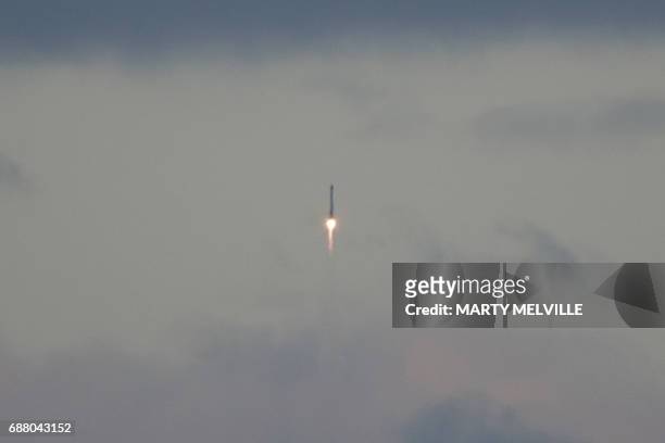 Rocket Lab's Electron rocket lifts off from its launch site in Mahia, on the east coast of New Zealand's North Island on May 25, 2017. New Zealand...