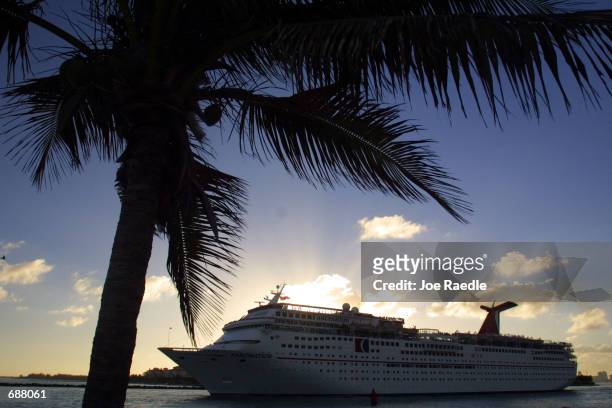 The Carnival Corp. Cruise ship Fascination sets sail December 17, 2001 in Miami, Florida. Setting the stage for a battle of the cruise-ship giants,...