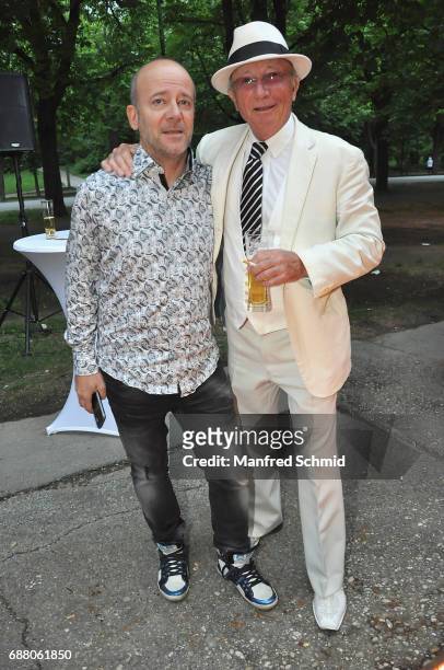 Andy Lee Lang and Louie Austen pose during the 'Die Allee zum Genuss' restaurant opening party on May 24, 2017 in Vienna, Austria.