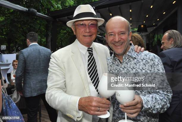 Louie Austen and Andy Lee Lang pose during the 'Die Allee zum Genuss' restaurant opening party on May 24, 2017 in Vienna, Austria.