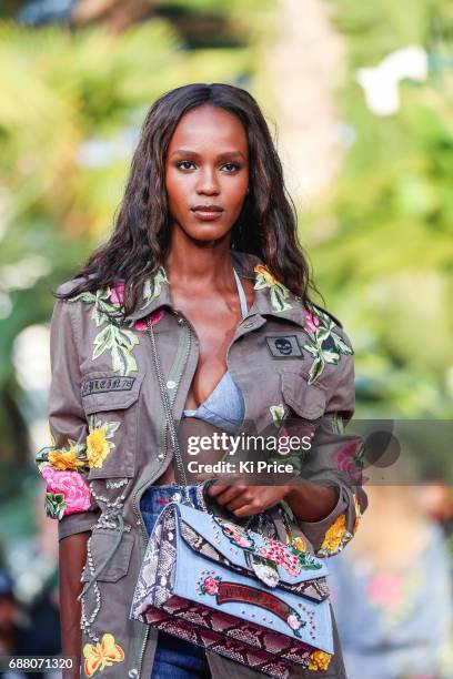 Model walks the runway at Philipp Plein Cruise Show 2018 during the 70th annual Cannes Film Festival at on May 24, 2017 in Cannes, France.