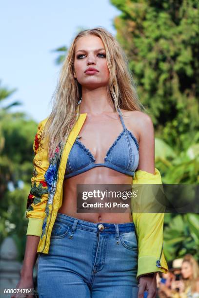 Model walks the runway at Philipp Plein Cruise Show 2018 during the 70th annual Cannes Film Festival at on May 24, 2017 in Cannes, France.