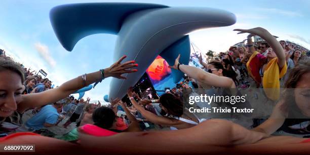 Inflatable whales crowd surf while MGMT performs on the Hangout Stage during 2017 Hangout Music Festival on May 19, 2017 in Gulf Shores, Alabama.