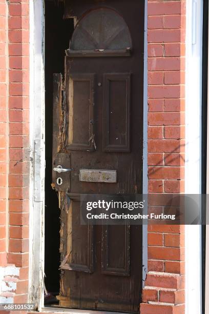 The front door of a home in Mosside where explosive damage can be seen after being raided by anti-terror police during the investigation of the...