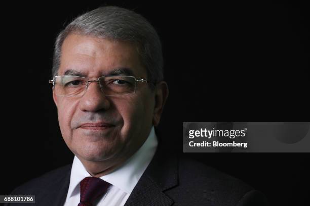 Amr El-Garhy, Egypt's finance minister, poses for a photograph following a Bloomberg Television interview in London, U.K., on Thursday, May 25, 2017....