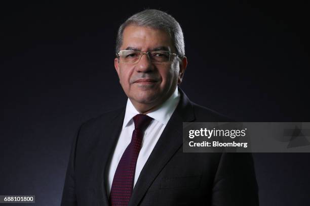 Amr El-Garhy, Egypt's finance minister, poses for a photograph following a Bloomberg Television interview in London, U.K., on Thursday, May 25, 2017....