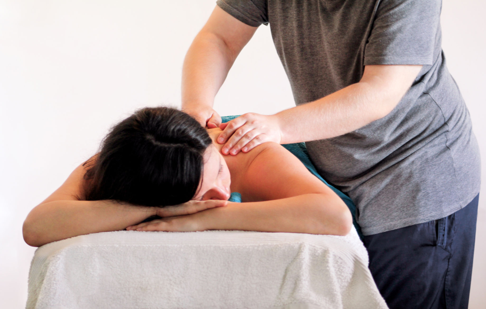 Massage studio. Relaxed beautiful woman with hand massage at beauty spa center. People, beauty, spa, healthy lifestyle and relaxation concept and having hand massage in spa. Body care. Massage studio. Relaxed beautiful woman with hand massage at beauty spa center. People, beauty, spa, healthy lifestyle and relaxation concept and having hand massage in spa. Body care.
