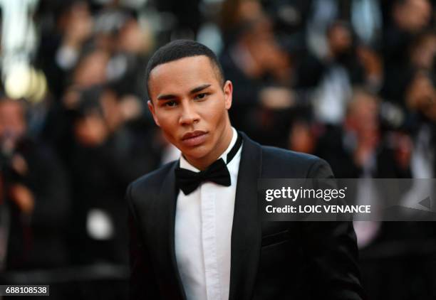 French fashion designer Olivier Rousteing poses as he arrives on May 24, 2017 for the screening of the film 'The Beguiled' at the 70th edition of the...