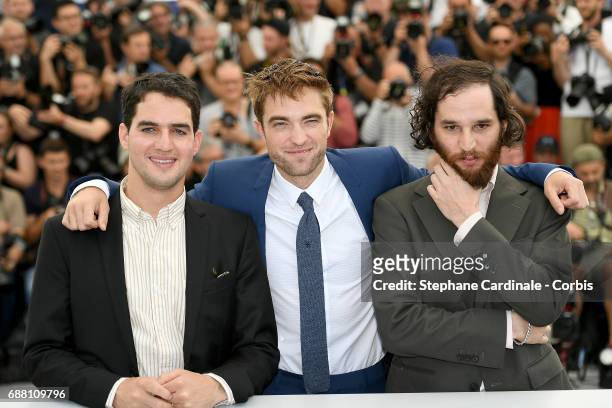 Directors Benny Safdie , Josh Safdie and actor Robert Pattinson attend the "Good Time" photocall during the 70th annual Cannes Film Festival at...
