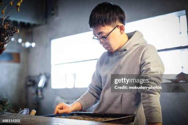 confident young male happy cafe owner - オーナー imagens e fotografias de stock