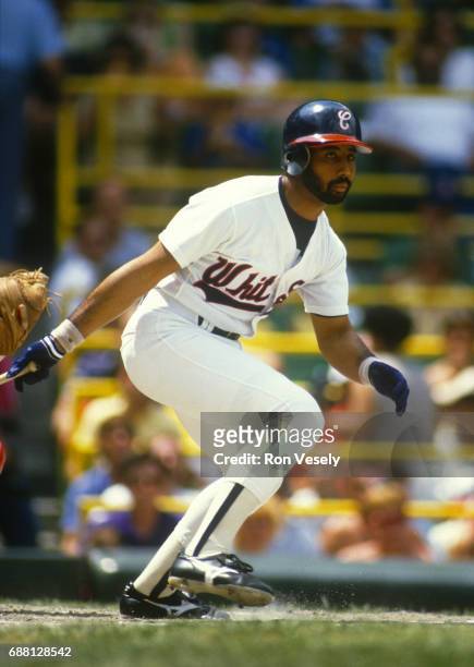 Harold Baines of the Chicago White Sox looks on during an MLB game at Comiskey Park in Chicago, Illinois. Baines played for the White Sox from...