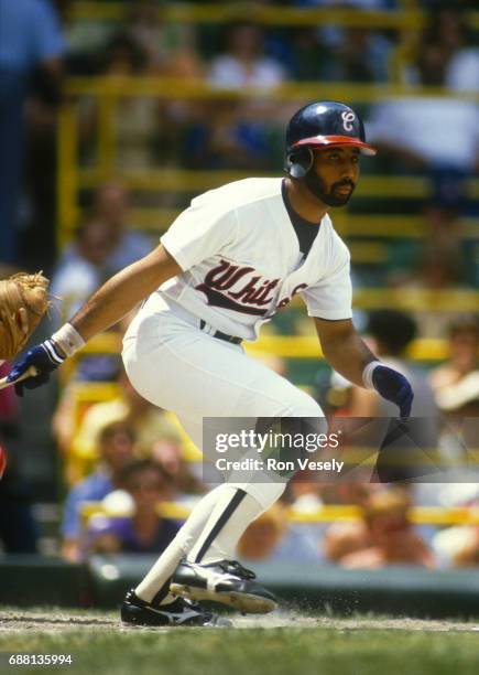 Harold Baines of the Chicago White Sox looks on during an MLB game at Comiskey Park in Chicago, Illinois. Baines played for the White Sox from...