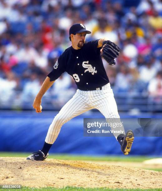 Jack McDowell of the Chicago White Sox pitches during an MLB game at new Comiskey Park in Chicago, Illinois. McDowell played for the White Sox from...