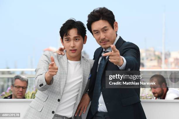 Actors Yim Si-wan and Kyoung-gu Sul attend the "The Merciless" photocall during the 70th annual Cannes Film Festival at Palais des Festivals on May...