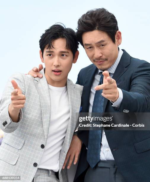 Actors Yim Si-wan and Kyoung-gu Sul attend the "The Merciless" photocall during the 70th annual Cannes Film Festival at Palais des Festivals on May...