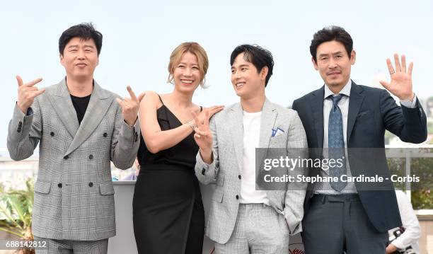 Actors Kim Hee-won, Hye-Jin Jeon, Yim Si-wan and Kyoung-gu Sul attends the "The Merciless" photocall during the 70th annual Cannes Film Festival at...