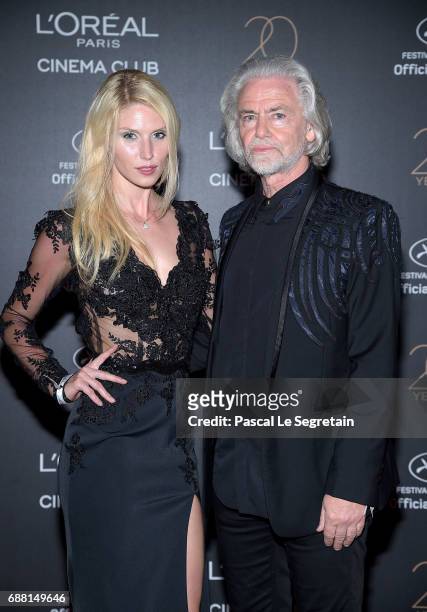Hermann Buehlbecker and guest attend the Gala 20th Birthday Of L'Oreal In Cannes during the 70th annual Cannes Film Festival at Martinez Hotel on May...
