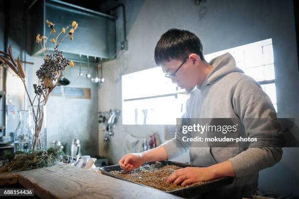 confident young male happy cafe owner - 静かな情景 stock pictures, royalty-free photos & images