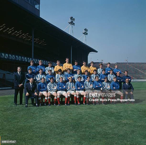 Group photograph of players and officials of Glasgow Rangers FC posed together on the pitch at Ibrox Stadium in Glasgow at the start of the 1970-71...