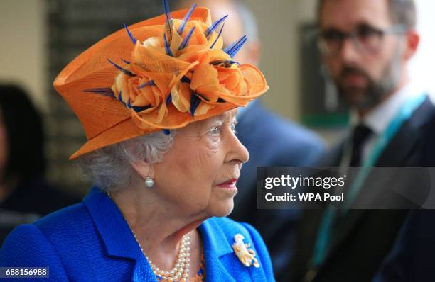 Queen Elizabeth II visits the Royal Manchester Children's Hospital to meet victims of the terror attack in the city earlier this week and to thank...
