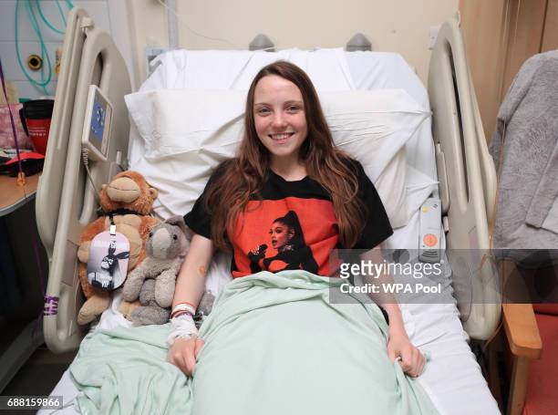 Millie Robson from Co Durham, wearing Arianna Grande t-shirt, a victim of Manchester Arena bombing as Queen Elizabeth II visits the Royal Manchester...