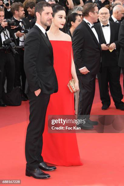 Melvil Poupaud and Fan Bingbing attend the'The Beguiled' screening during the 70th annual Cannes Film Festival at Palais des Festivals on May 24,...