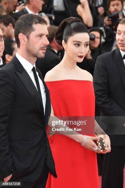 Melvil Poupaud and Fan Bingbing attend the'The Beguiled' screening during the 70th annual Cannes Film Festival at Palais des Festivals on May 24,...