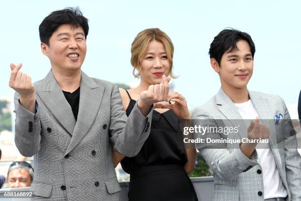 South Korean actor Kim Hie-won, South Korean actress Jeon Hye-jin and South Korean actor Yim Si-wan attend the "The Merciless" photocall during the...