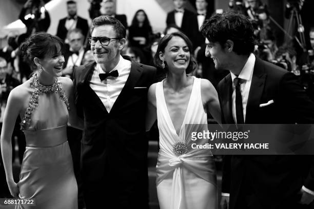 French-British actress Stacy Martin, French director Michel Hazanavicius, French-Argentinian actress Berenice Bejo and French actor Louis Garrel pose...