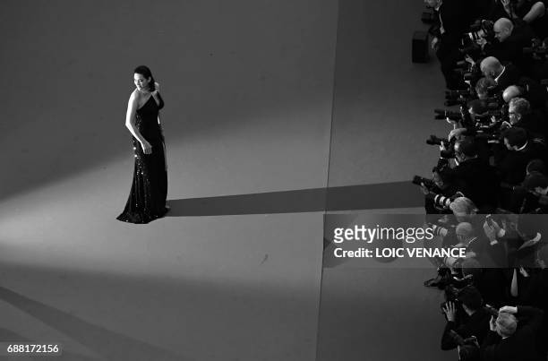 French actress Marion Cotillard poses as she arrives on May 23, 2017 for the '70th Anniversary' ceremony of the Cannes Film Festival in Cannes,...