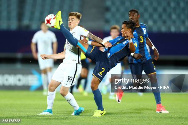 Denil Maldonado of Honduras wins the ball over Myer Bevan of New Zealand during the FIFA U-20 World Cup Korea Republic 2017 group E match between New...